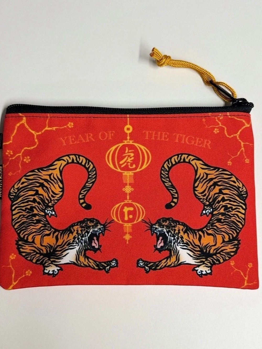 The Tiger Utility Zipper Pouch from Rickshaw Bagworks.
